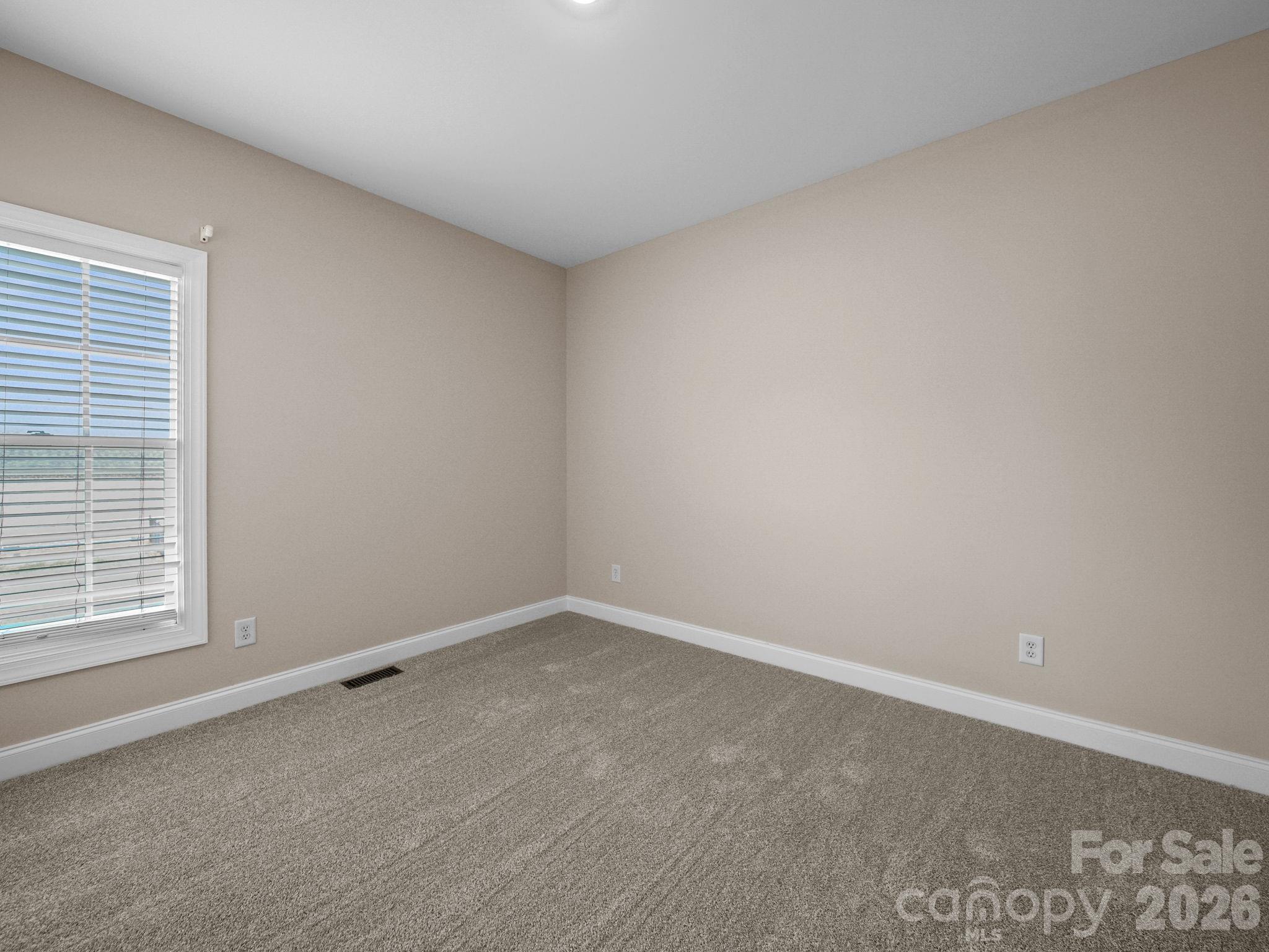 715 Witmore Road Wingate, NC 28174 - Photo 26 of 48 an empty room with a window