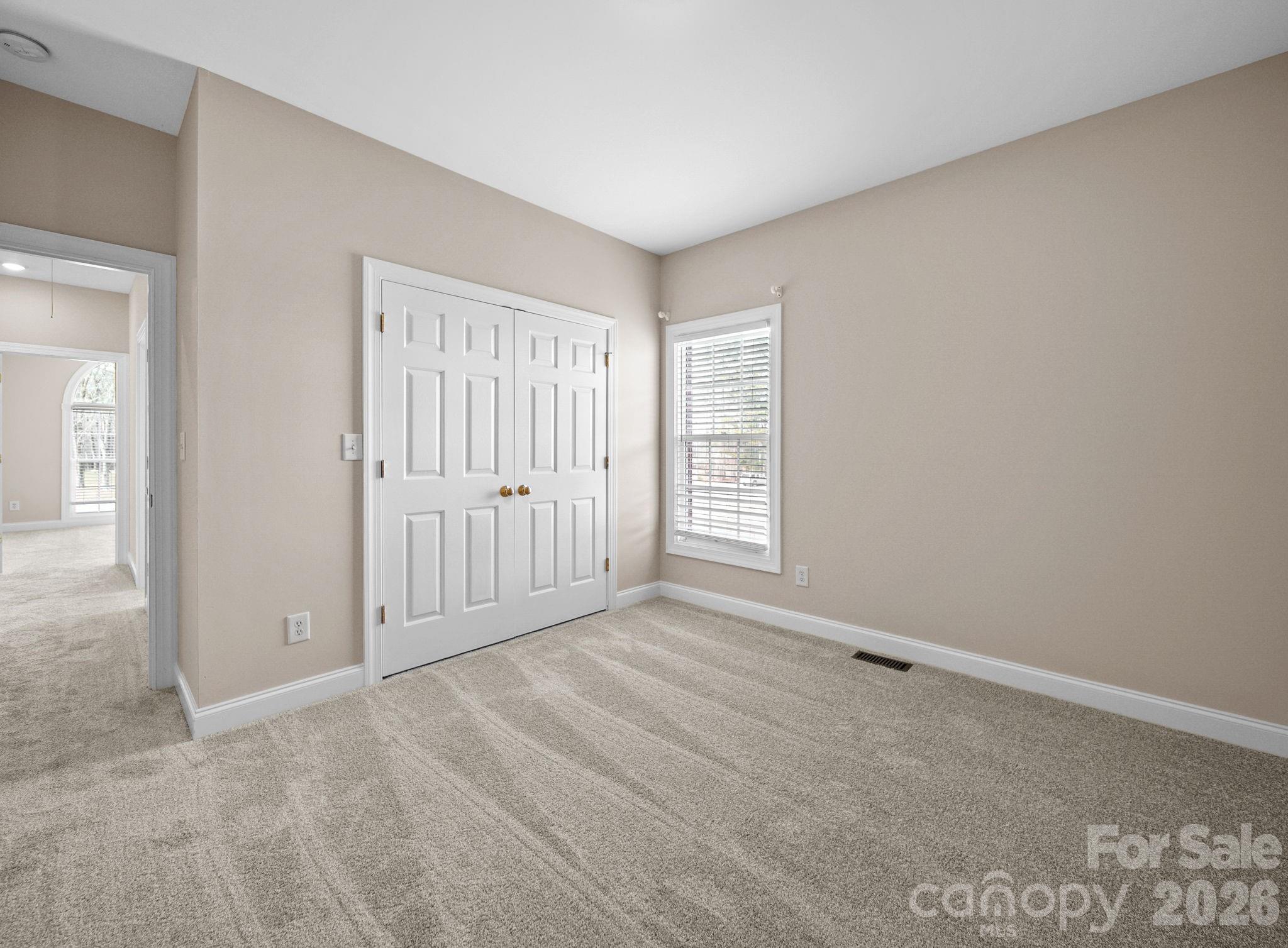 715 Witmore Road Wingate, NC 28174 - Photo 27 of 48 an empty room with windows