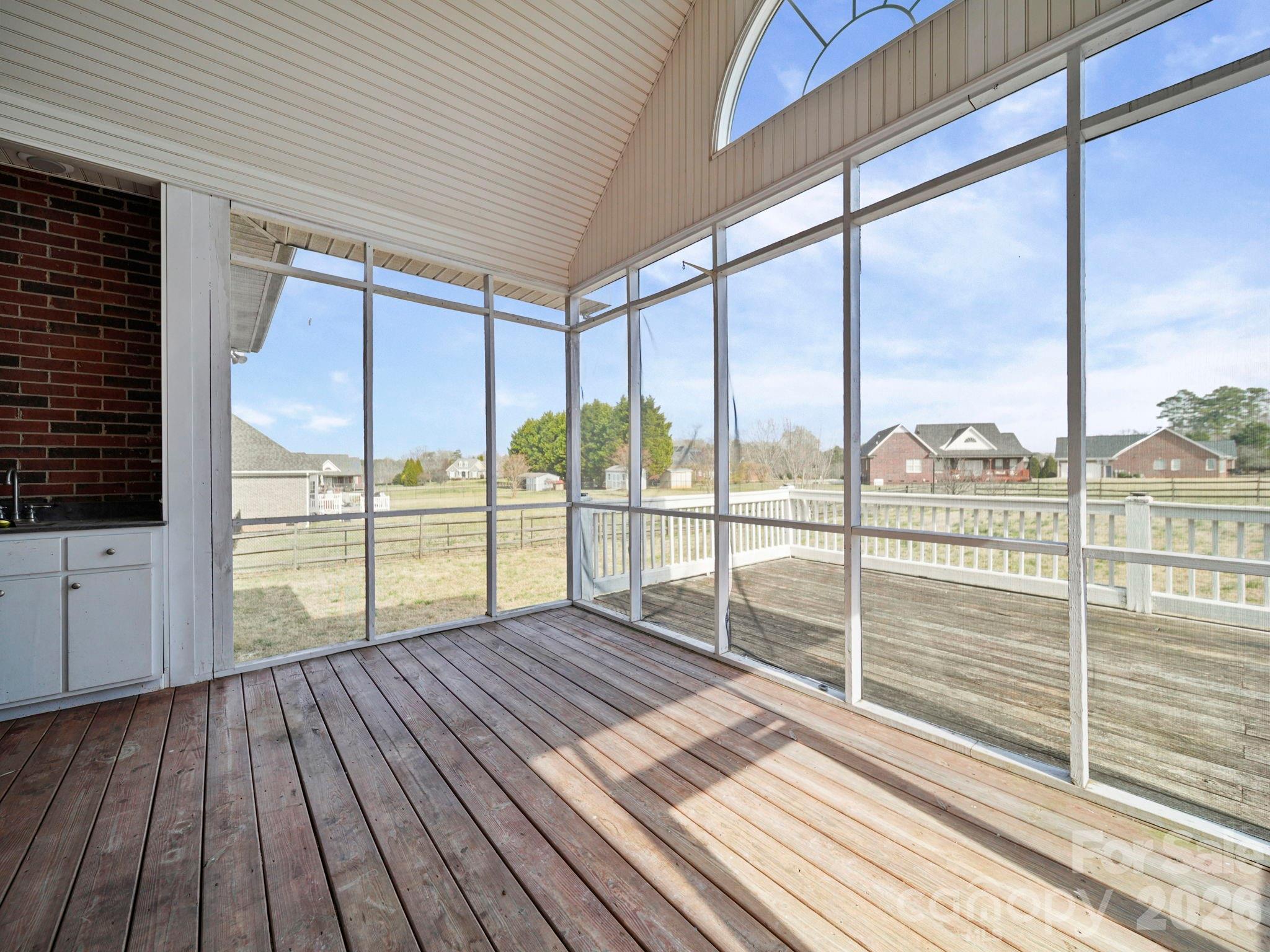 715 Witmore Road Wingate, NC 28174 - Photo 34 of 48 a view of balcony with wooden floor