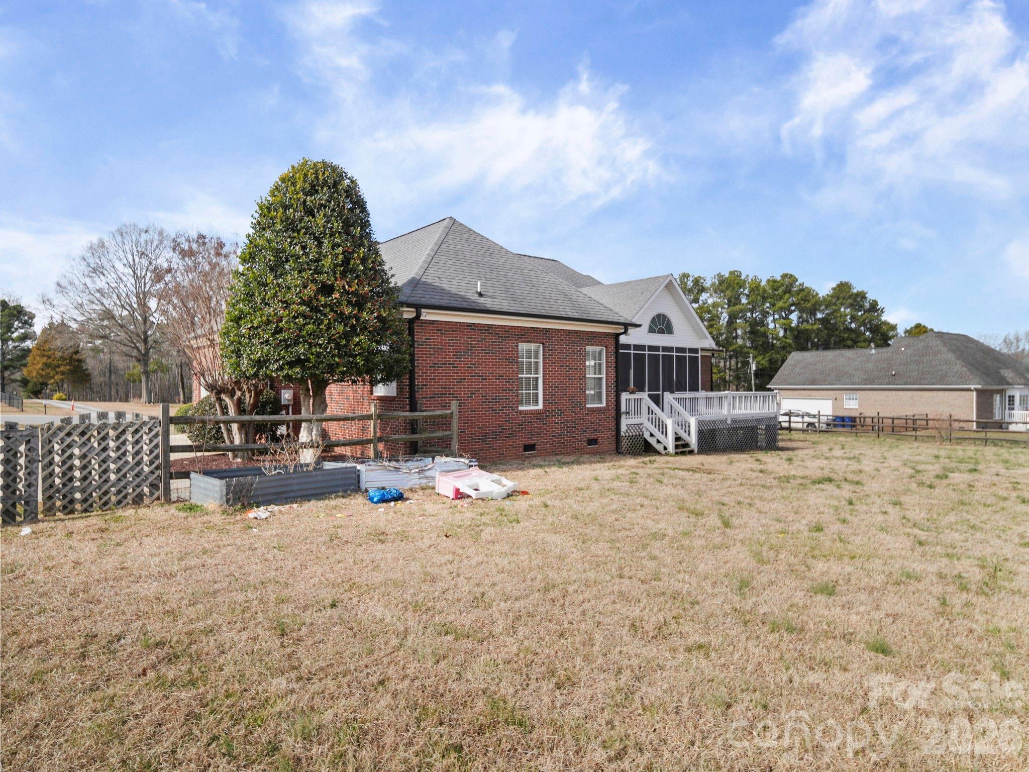 715 Witmore Road Wingate, NC 28174 - Photo 40 of 48 a view of a house with patio