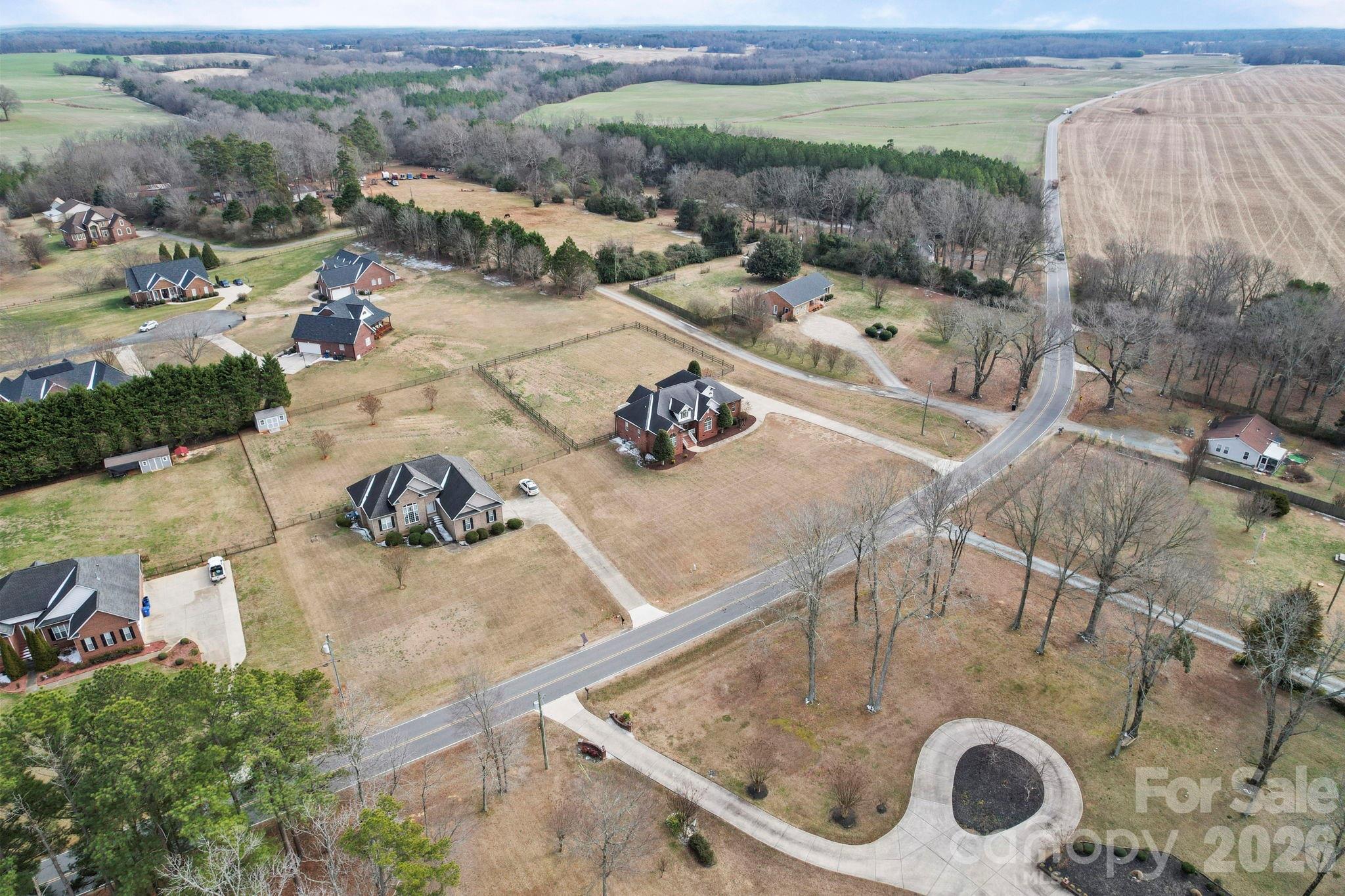 715 Witmore Road Wingate, NC 28174 - Photo 44 of 48 an aerial view of a house having yard