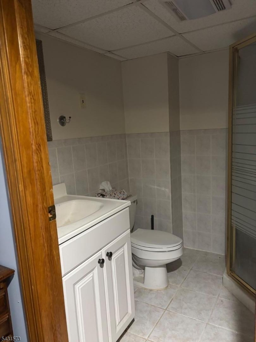 358 Woodland Road, Unit 2 Madison, NJ 07940 - Photo 43 of 50 a bathroom with a sink a toilet and a shower