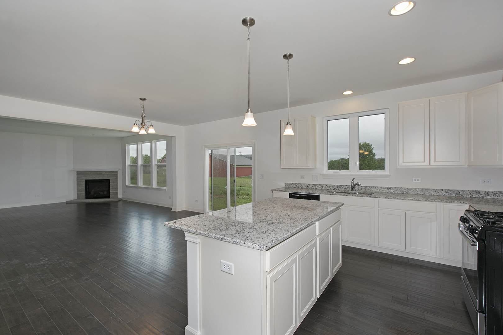 4398 Charles Dickens Road Elgin, IL 60124 - Photo 8 of 29 a kitchen with a stove and kitchen island