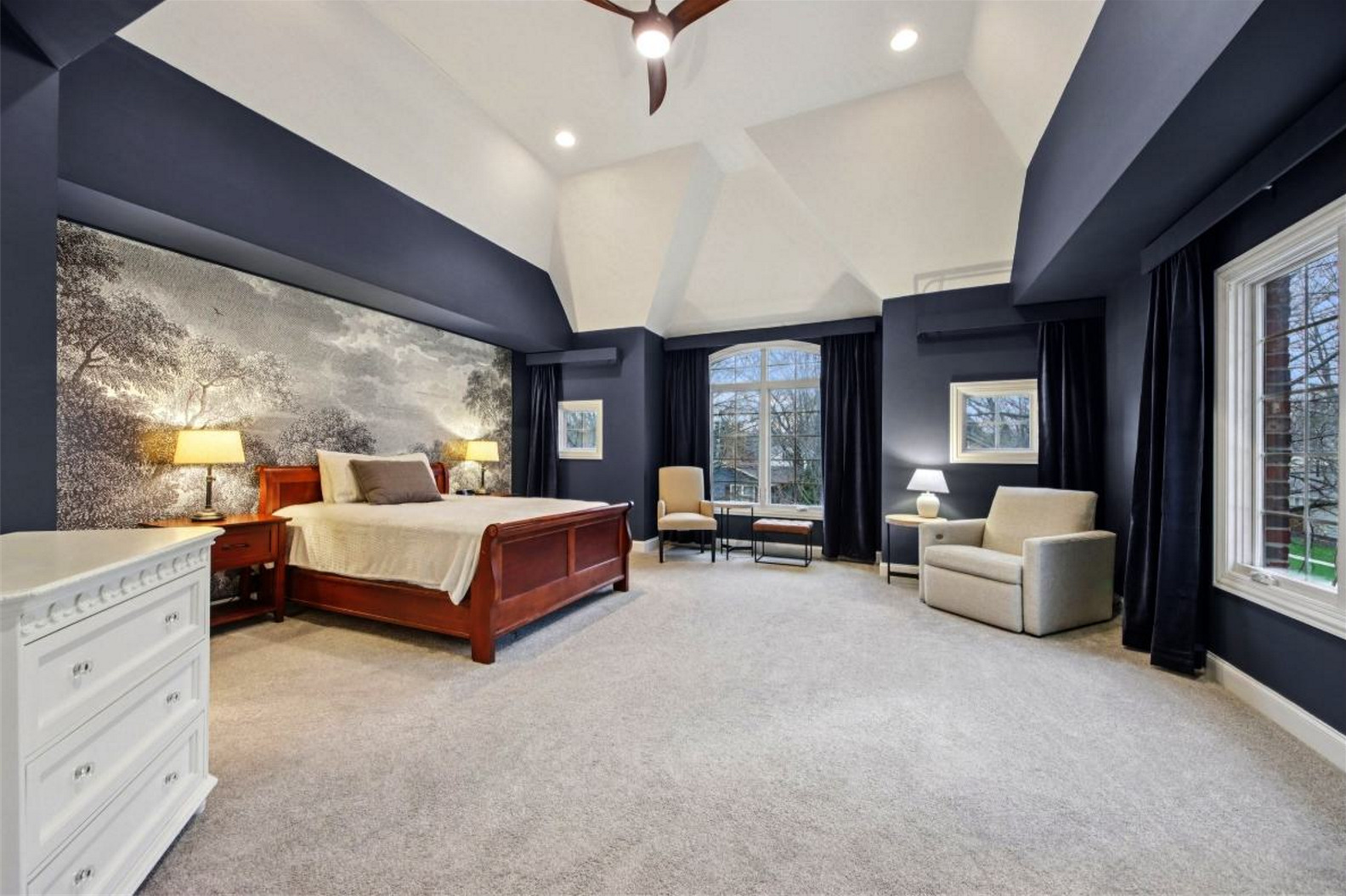 1135 North Main Street Naperville, IL 60563 - Photo 22 of 52 a spacious bedroom with a bed and a large window