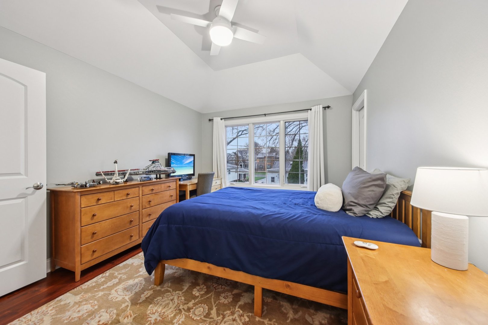 1135 North Main Street Naperville, IL 60563 - Photo 28 of 52 a bedroom with a bed and wooden floor