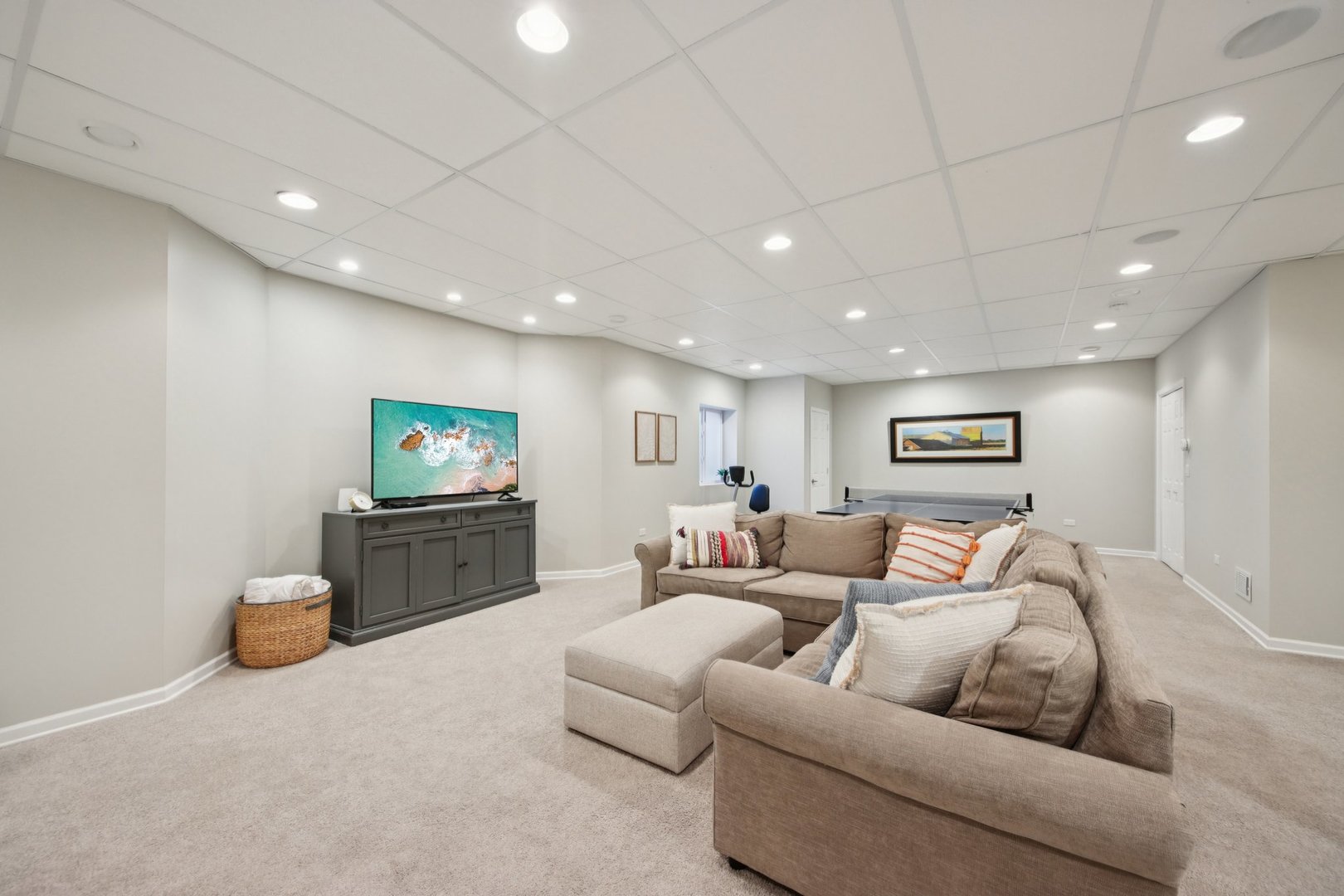 1135 North Main Street Naperville, IL 60563 - Photo 37 of 52 a living room with furniture and a flat screen tv