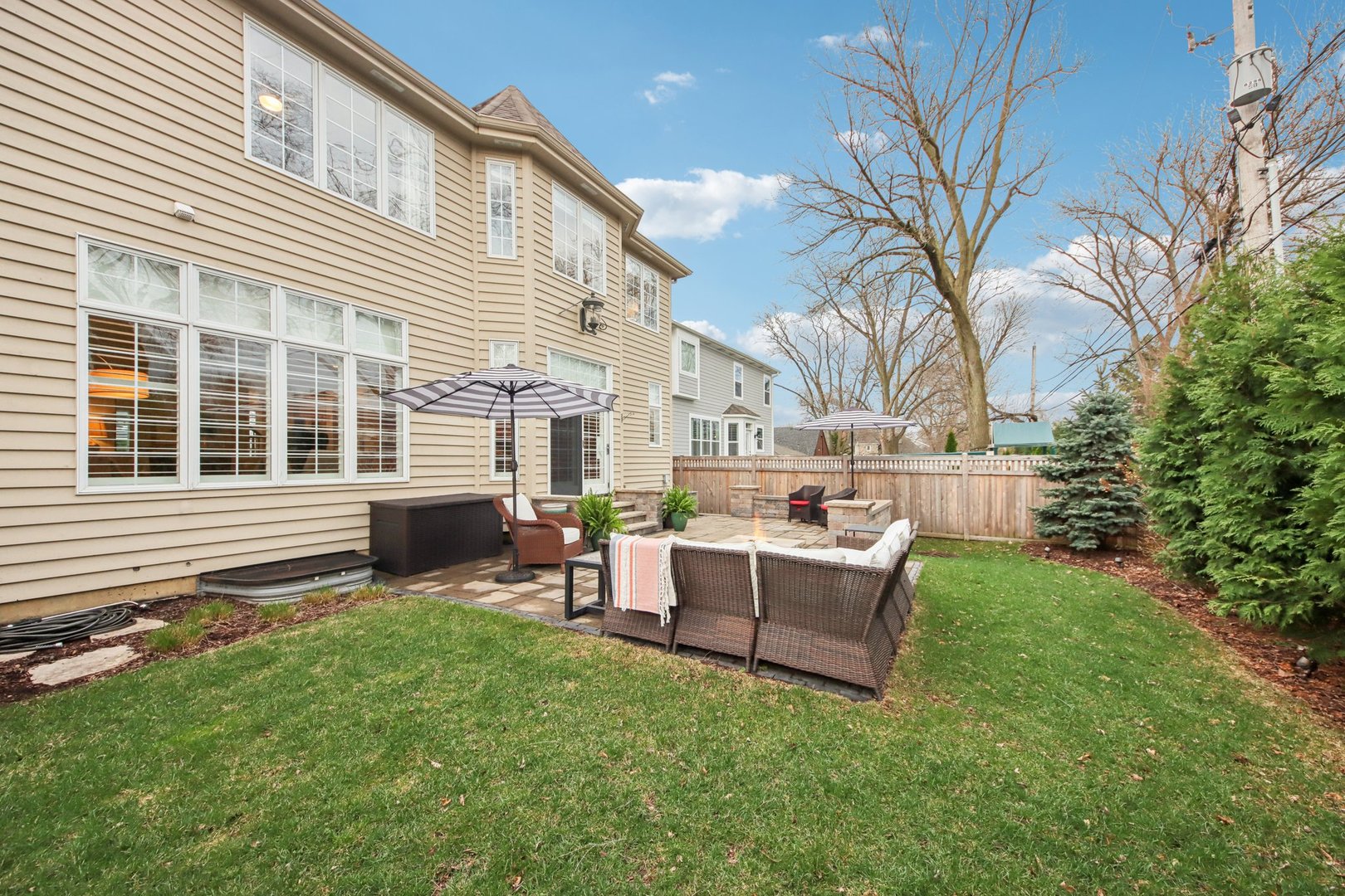 1135 North Main Street Naperville, IL 60563 - Photo 47 of 52 a view of a house with backyard and sitting area