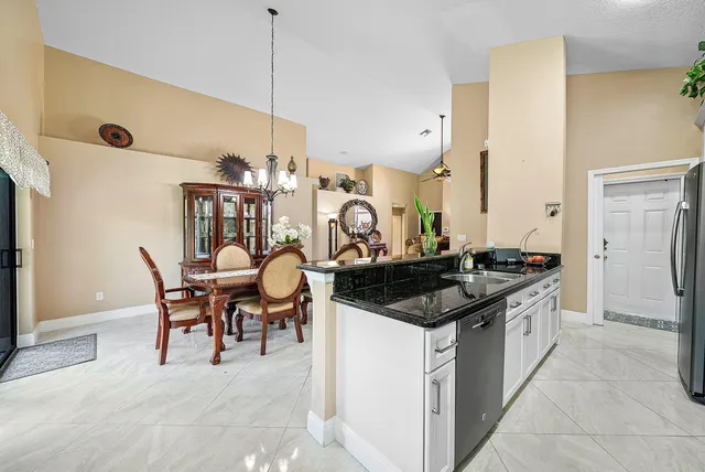 a bed room with a bed and a television