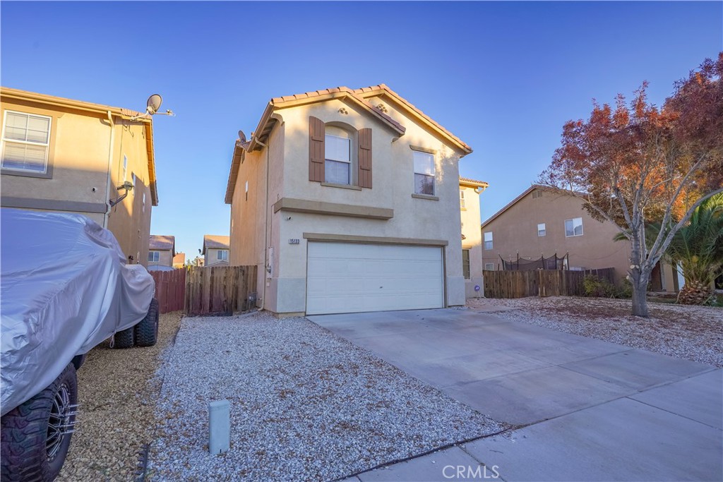 15133 Pasture Way Victorville, CA 92394 - Photo 2 of 48 a view of a house with a yard