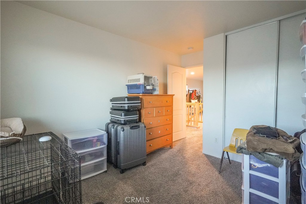 15133 Pasture Way Victorville, CA 92394 - Photo 34 of 48 a room with storage and utility