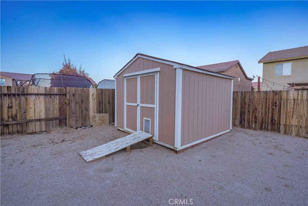 15133 Pasture Way Victorville, CA 92394 - Photo 44 of 48 a view of a house with wooden fence