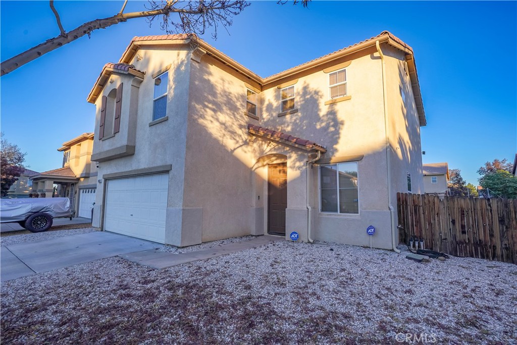 15133 Pasture Way Victorville, CA 92394 - Photo 5 of 48 a view of a house with a backyard