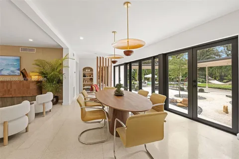 a outdoor space with patio the couches and a dining table with the garden view