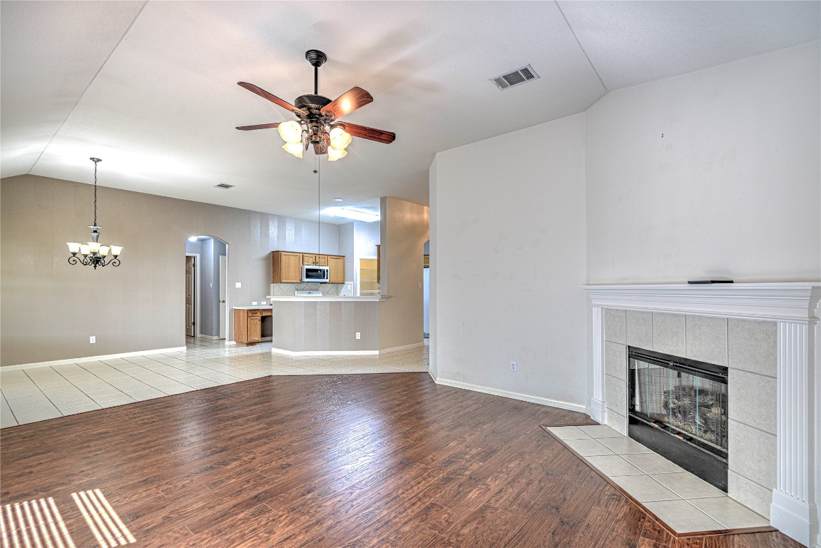 1900 Rutherford Drive Leander, TX 78641 - Photo 14 of 38 a view of a kitchen with a sink and a fireplace