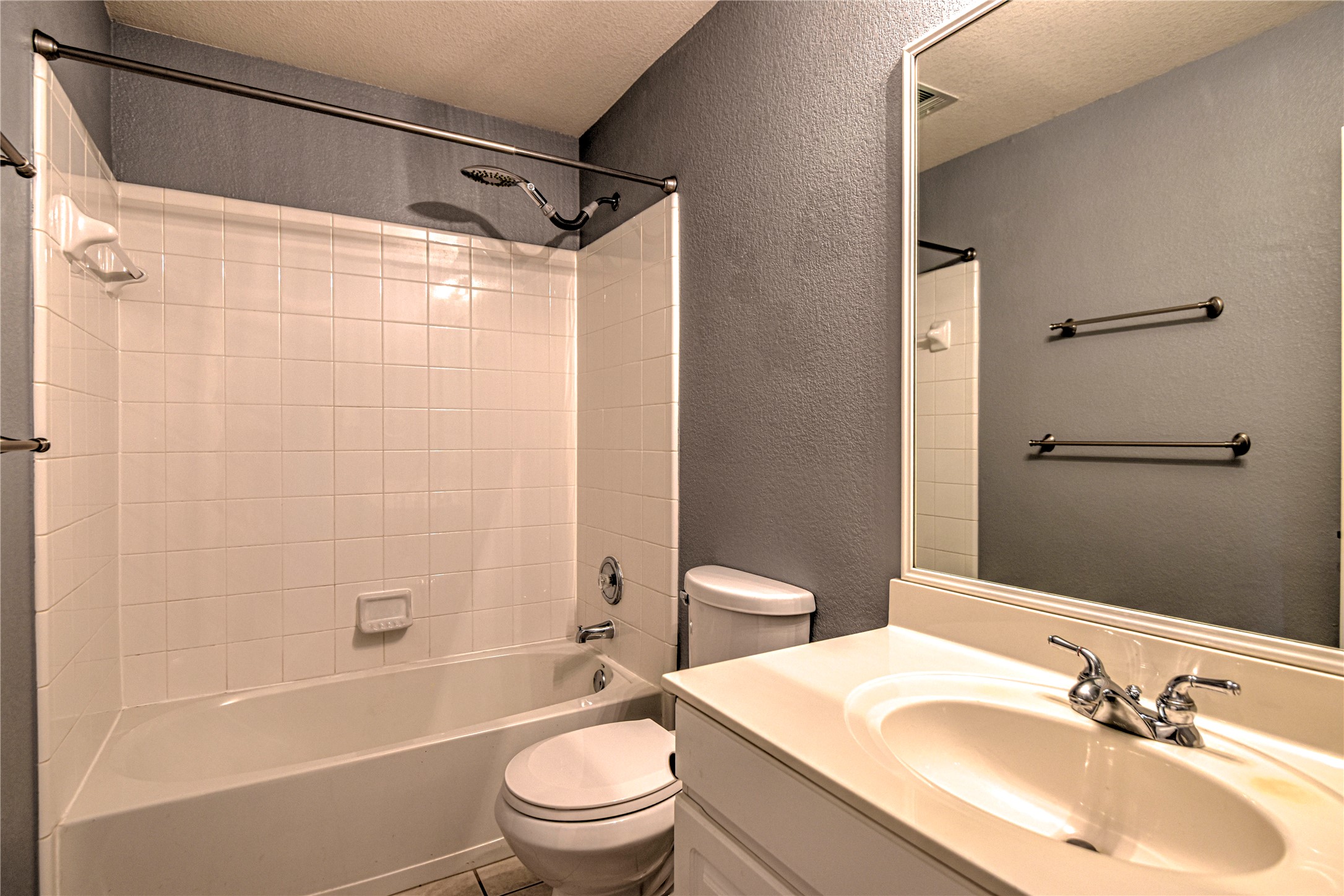 1900 Rutherford Drive Leander, TX 78641 - Photo 28 of 38 a bathroom with a sink toilet tub and shower