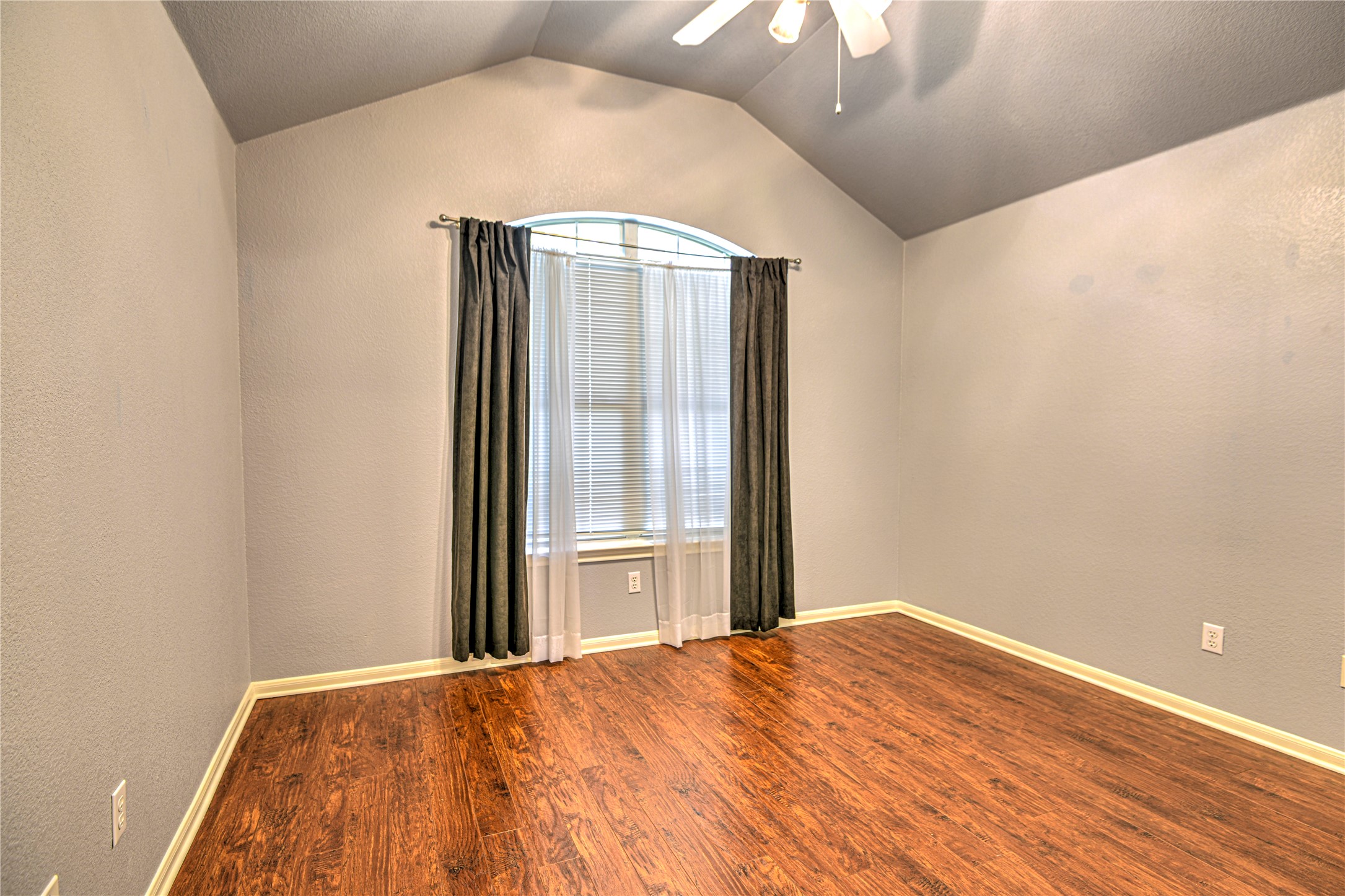 1900 Rutherford Drive Leander, TX 78641 - Photo 29 of 38 a view of a big room with wooden floor and windows