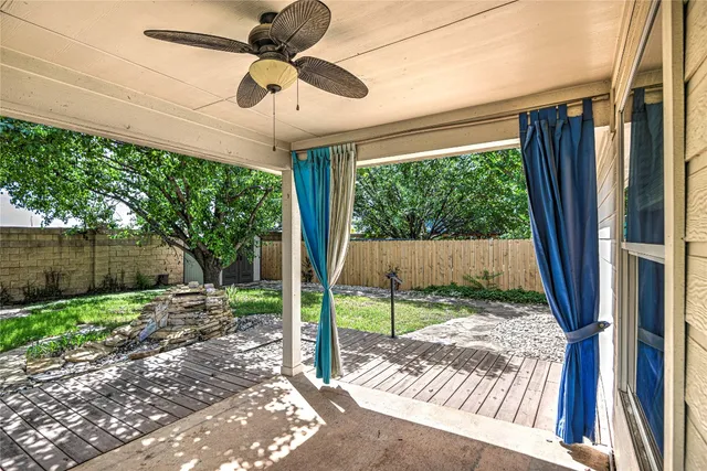 a house view with a backyard space
