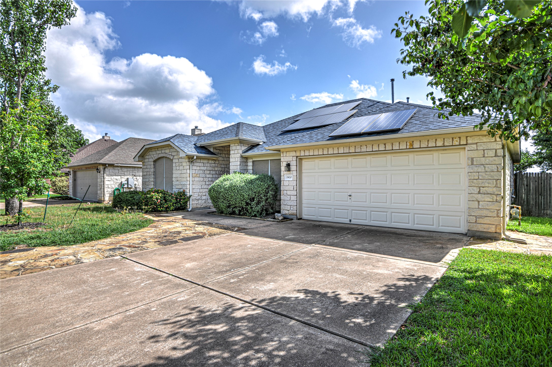 1900 Rutherford Drive Leander, TX 78641 - Photo 3 of 38 a view of a house with a yard