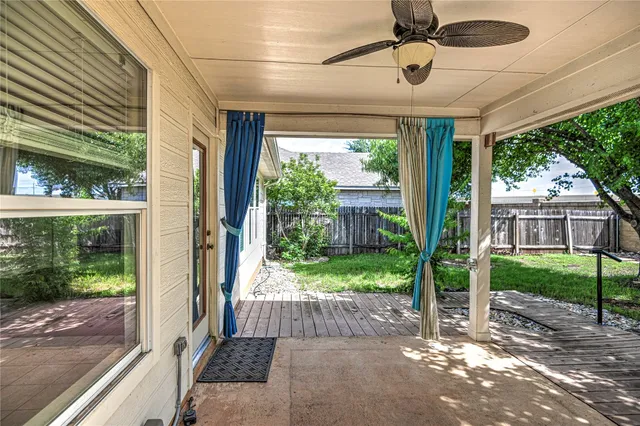 a view of backyard with a garden and plants