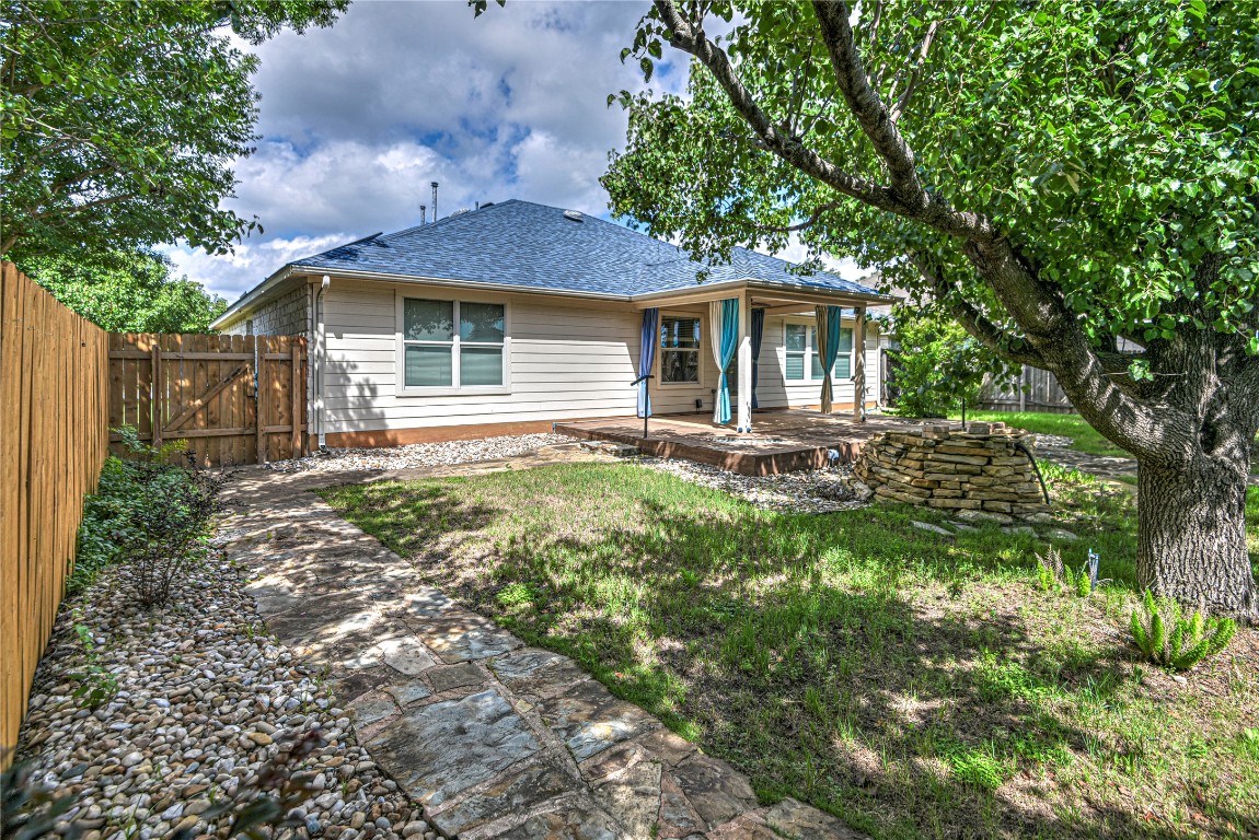 1900 Rutherford Drive Leander, TX 78641 - Photo 36 of 38 a front view of a house with yard