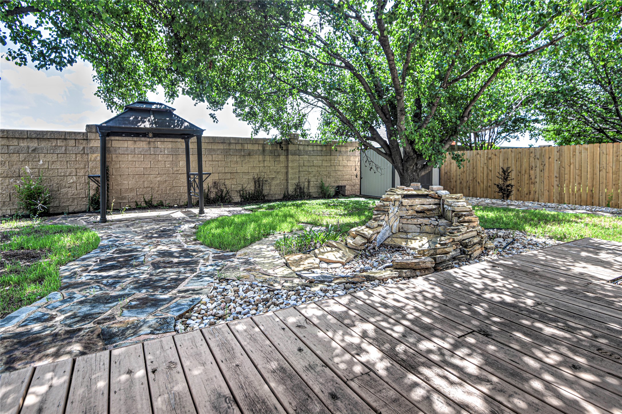 1900 Rutherford Drive Leander, TX 78641 - Photo 38 of 38 a front view of a house with garden