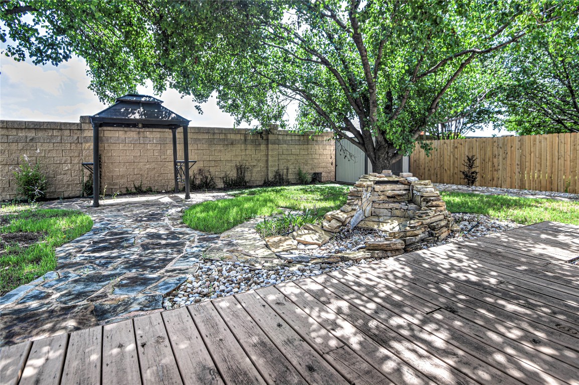 1900 Rutherford Drive Leander, TX 78641 - Photo 38 of 38 a front view of a house with garden