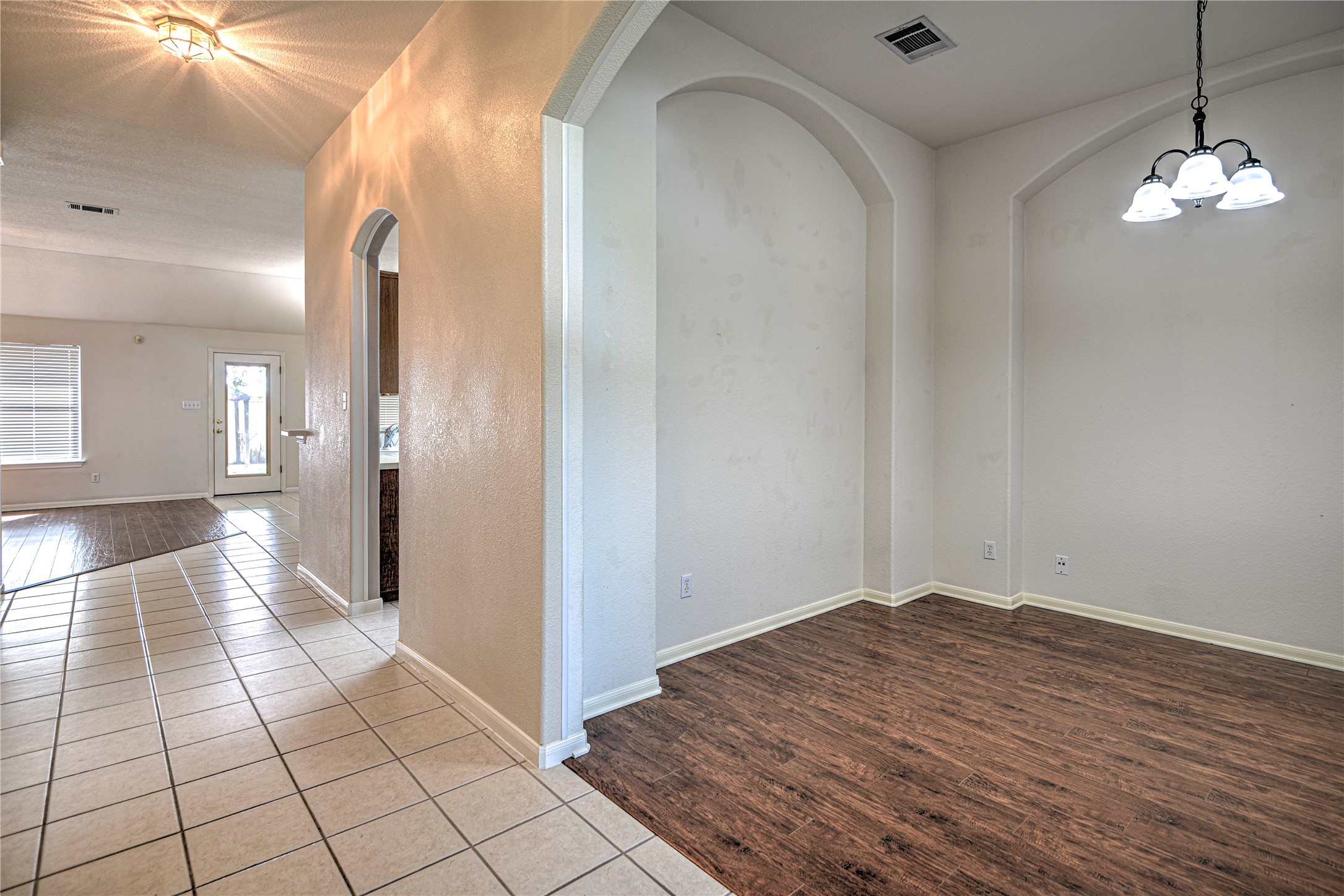 1900 Rutherford Drive Leander, TX 78641 - Photo 7 of 38 a view of a hallway with wooden floor
