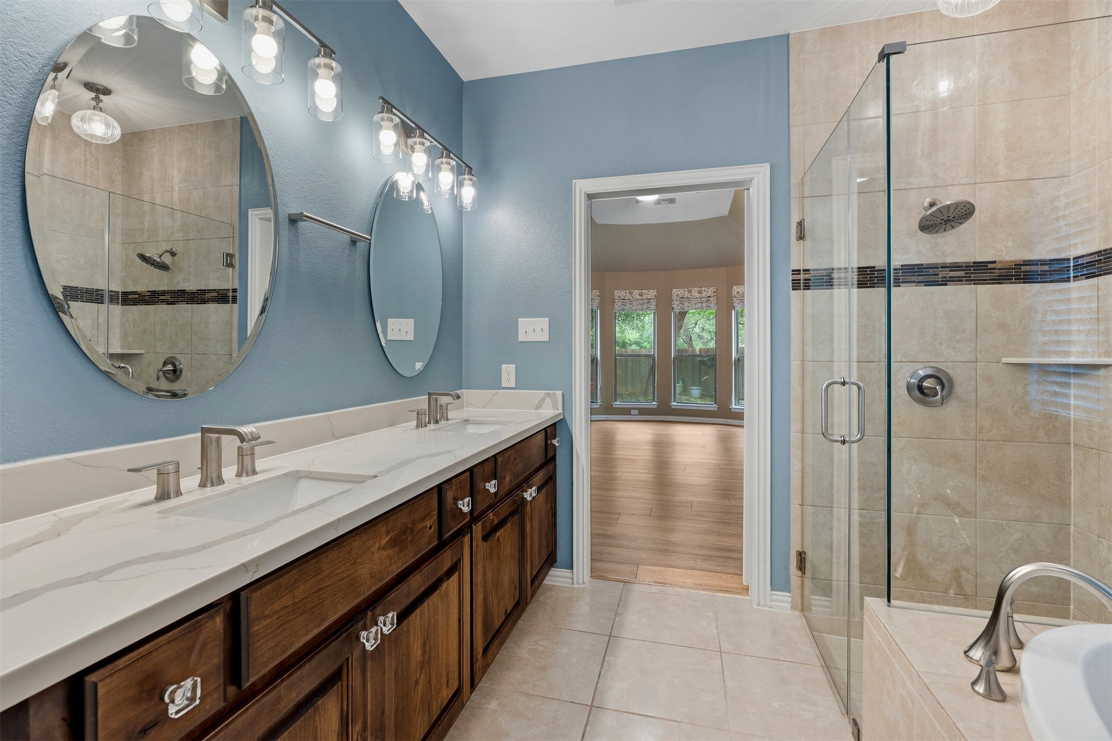 3935 Bowstring Bend Cedar Park, TX 78613 - Photo 22 of 39 The ensuite bath offers a dual vanity and a layout designed for a smooth morning routine