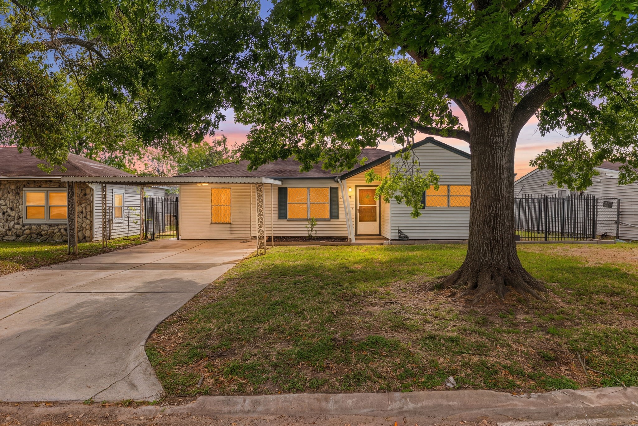 10923 Duane Street Houston, TX 77047 - Photo 1 of 22 a view of a house with backyard and tree s