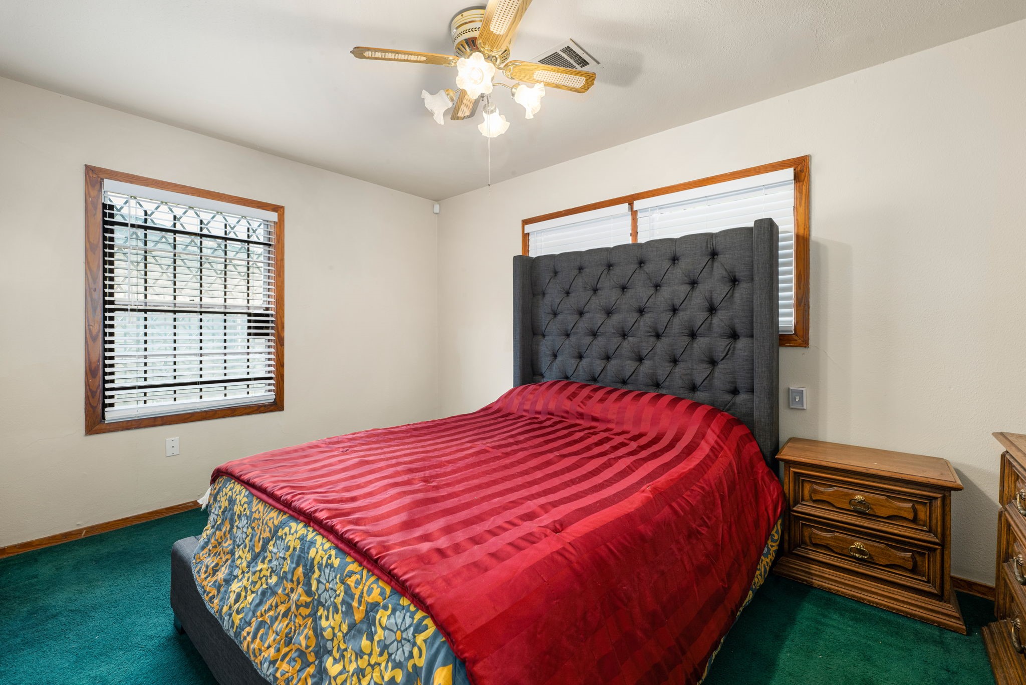 10923 Duane Street Houston, TX 77047 - Photo 12 of 22 a bedroom with a bed and a window
