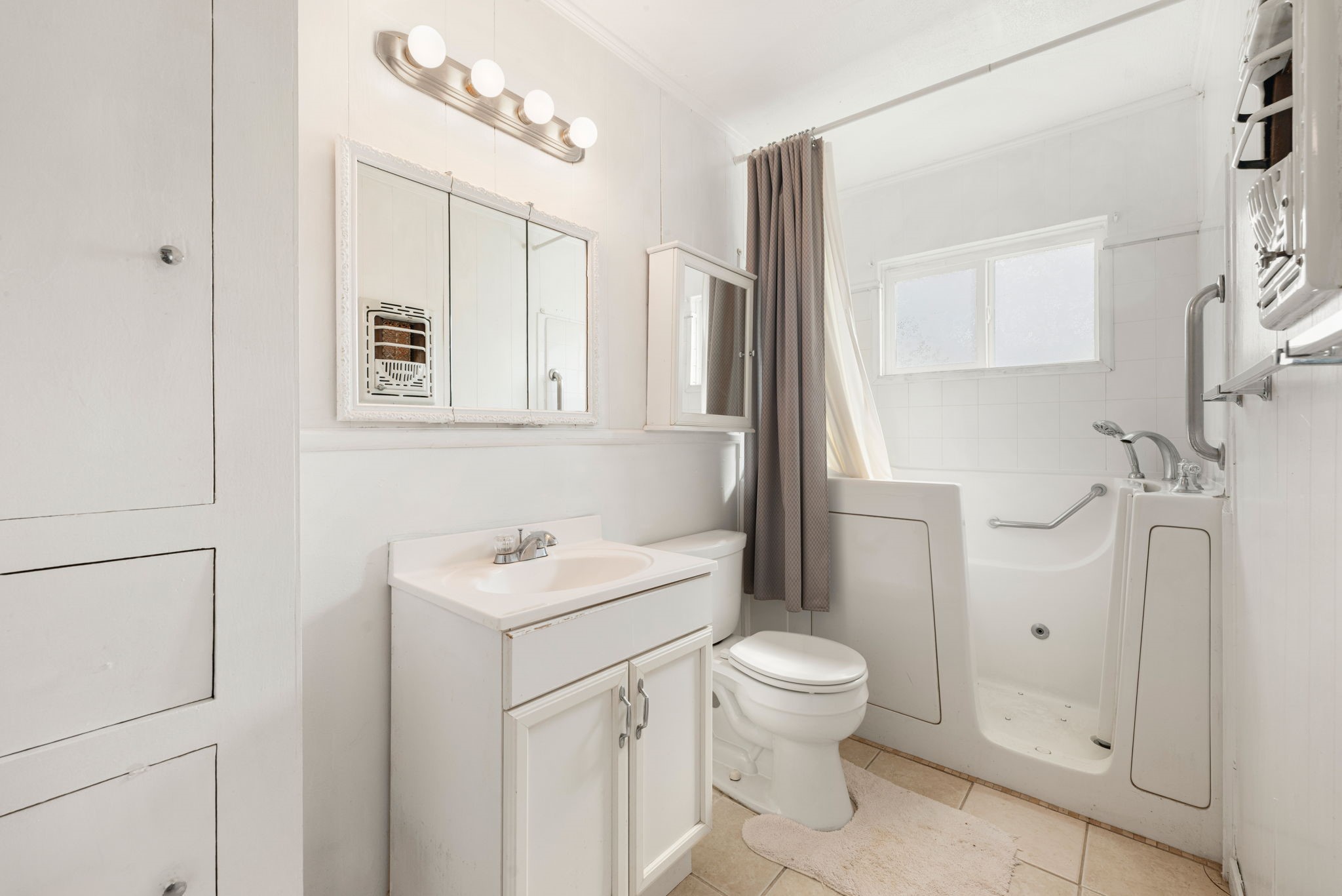 10923 Duane Street Houston, TX 77047 - Photo 14 of 22 a bathroom with a sink toilet and shower