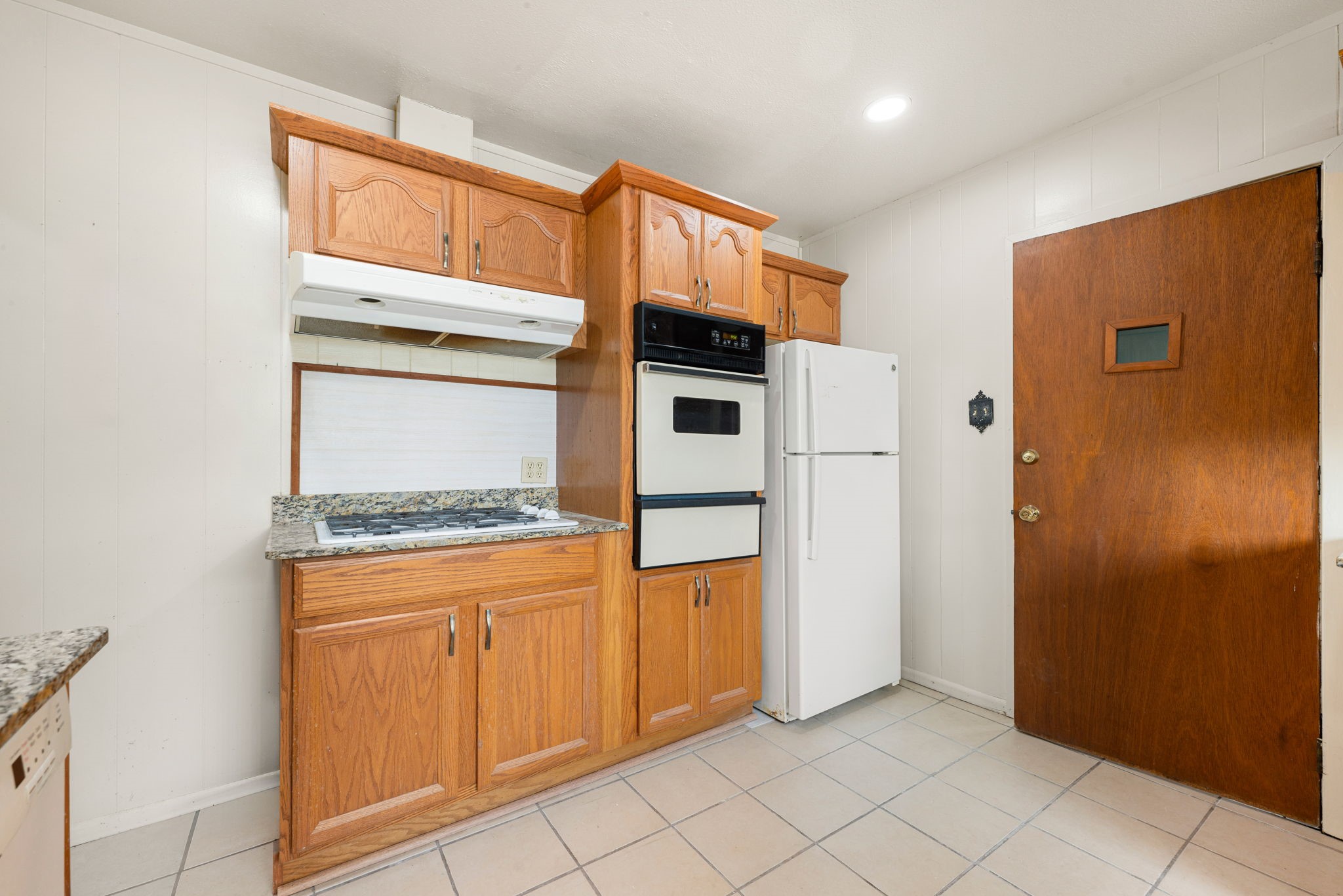 10923 Duane Street Houston, TX 77047 - Photo 15 of 22 a kitchen with stainless steel appliances granite countertop a refrigerator and a stove top oven