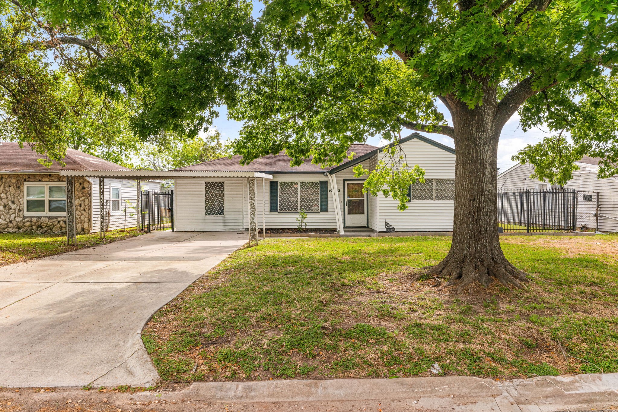 10923 Duane Street Houston, TX 77047 - Photo 2 of 22 a view of a house with a swimming pool