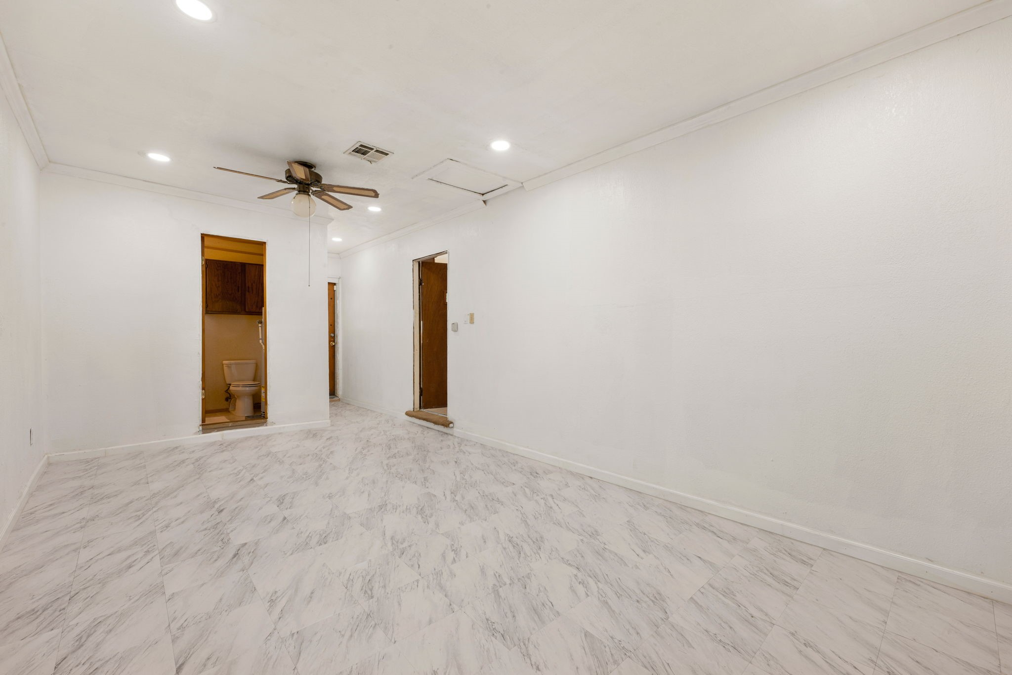 10923 Duane Street Houston, TX 77047 - Photo 21 of 22 a view of an empty room with glass door