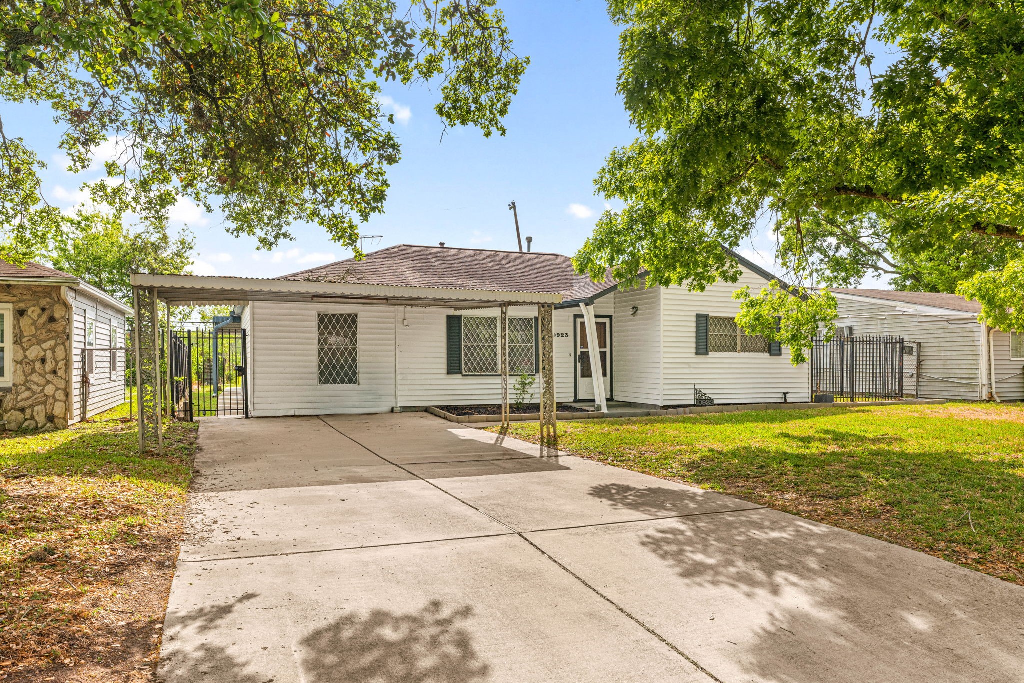 10923 Duane Street Houston, TX 77047 - Photo 3 of 22 a view of a house with a yard and sitting area
