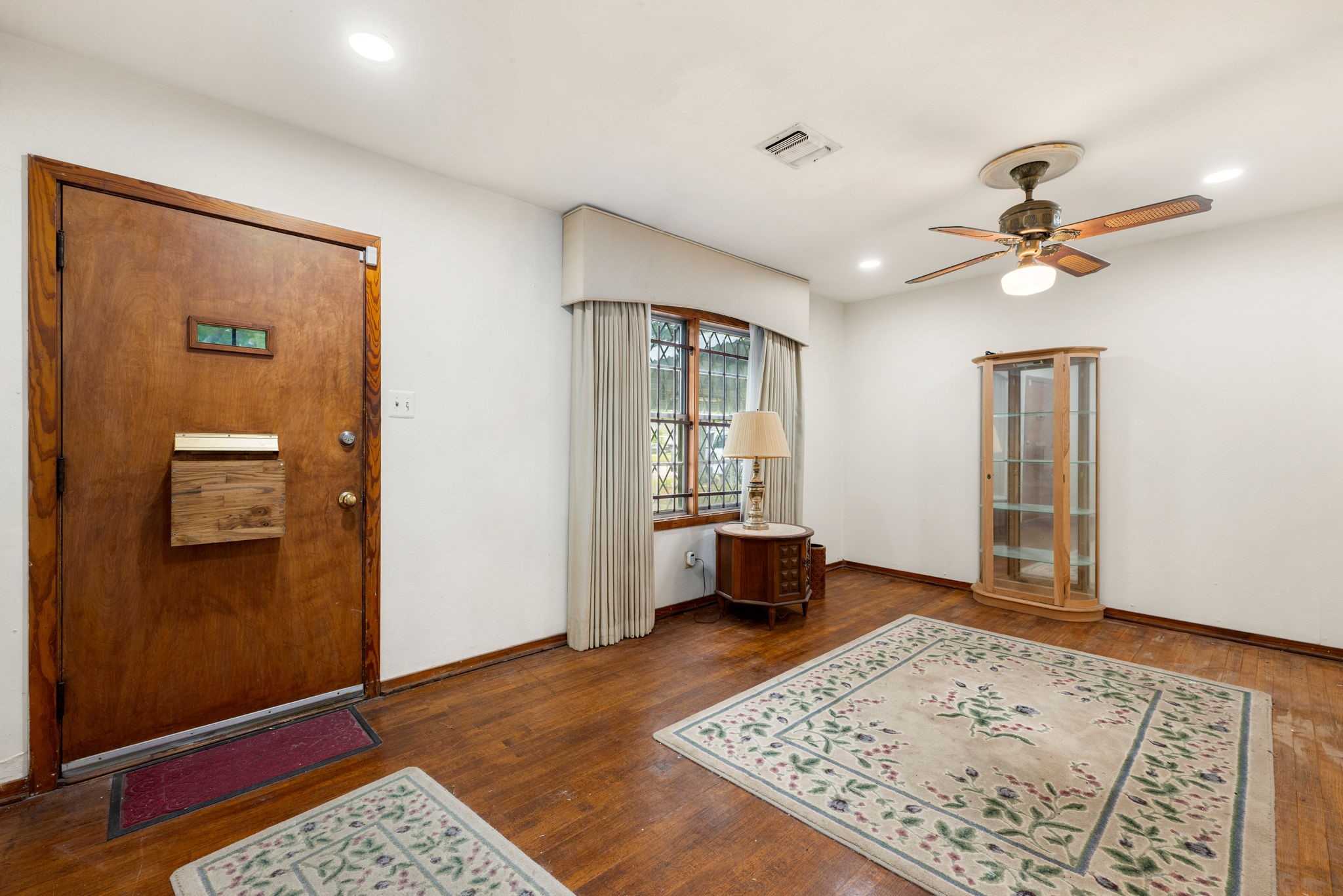 10923 Duane Street Houston, TX 77047 - Photo 6 of 22 a living room with furniture and a rug
