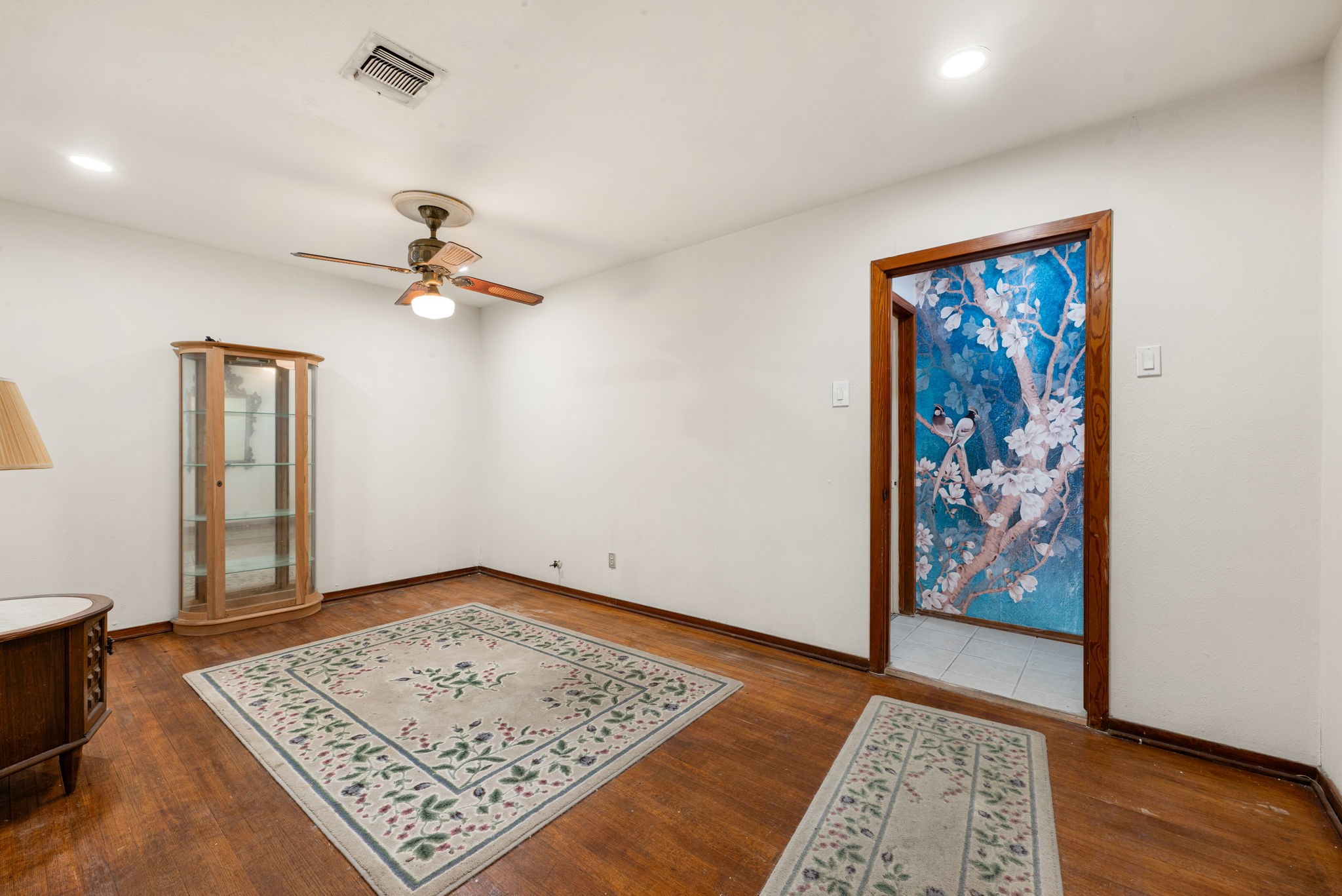 10923 Duane Street Houston, TX 77047 - Photo 7 of 22 a view of a hallway with front door