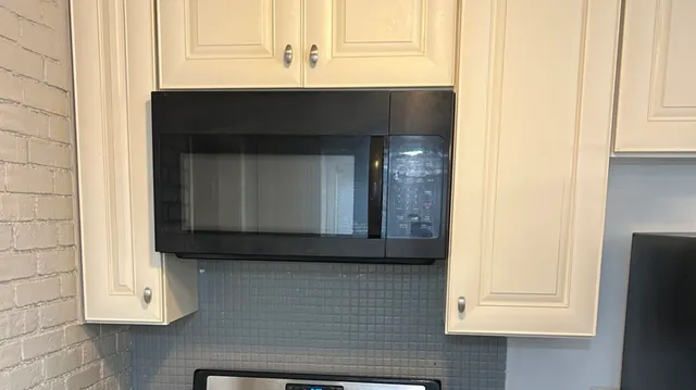 a view of a livingroom with a hallway