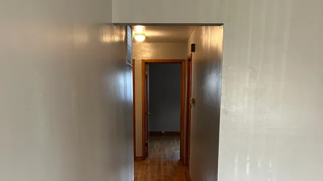 a view of an empty room and window