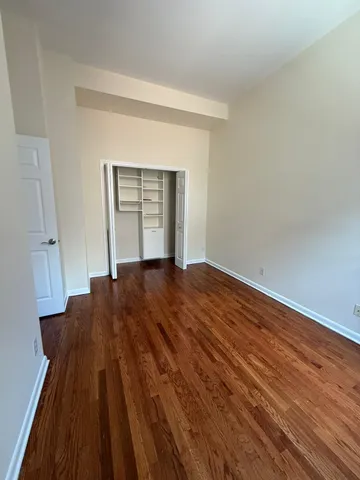 a kitchen with stainless steel appliances granite countertop a stove a refrigerator and a sink