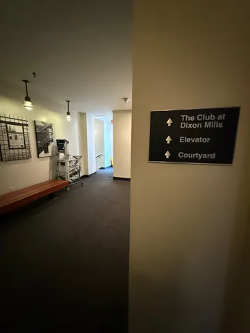 a view of a livingroom with furniture and a ceiling fan