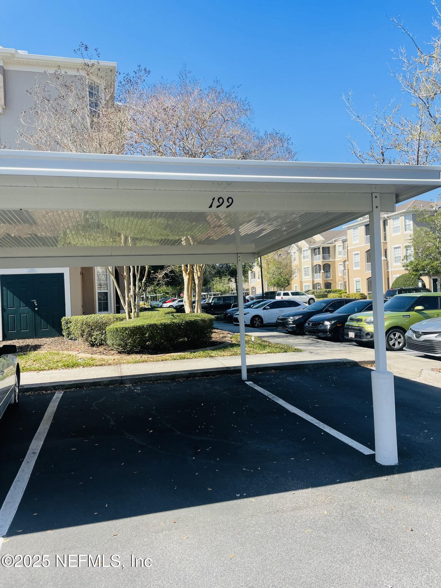 7990 Baymeadows Road East, Unit 426 Jacksonville, FL 32256 - Photo 10 of 19 a view of swimming pool with outdoor seating and a potted plant