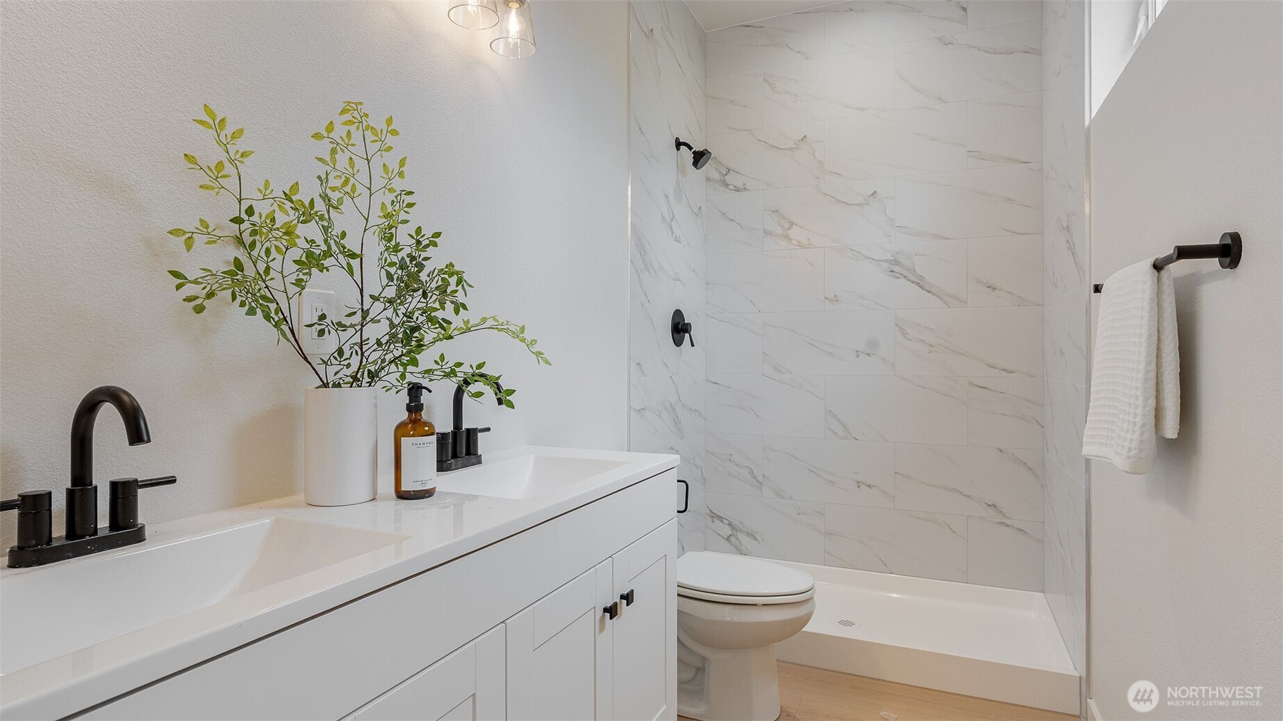 225 106th Street Southwest, Unit A2 Everett, WA 98204 - Photo 12 of 26 a bathroom with a sink a toilet and shower