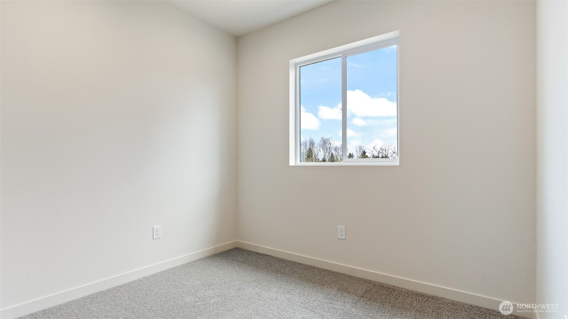 225 106th Street Southwest, Unit A2 Everett, WA 98204 - Photo 14 of 26 an empty room with a window