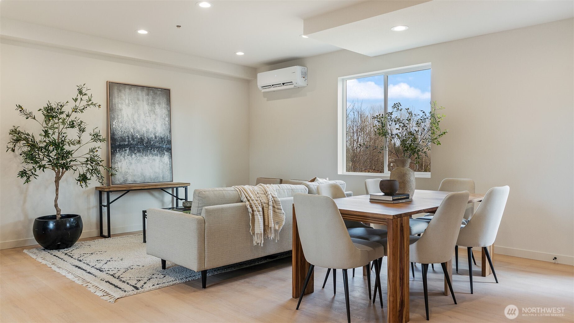225 106th Street Southwest, Unit A2 Everett, WA 98204 - Photo 2 of 26 a view of a dining room with furniture