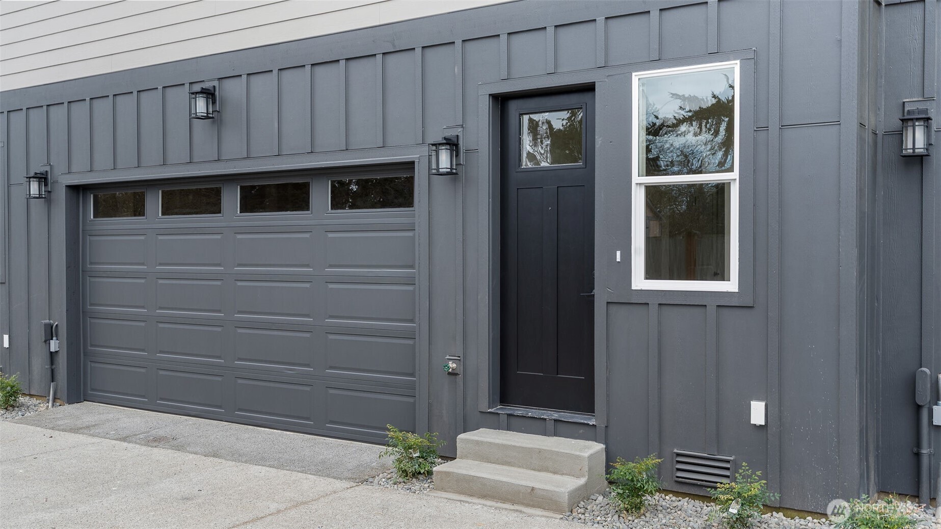 225 106th Street Southwest, Unit A2 Everett, WA 98204 - Photo 22 of 26 a view of front door and a house