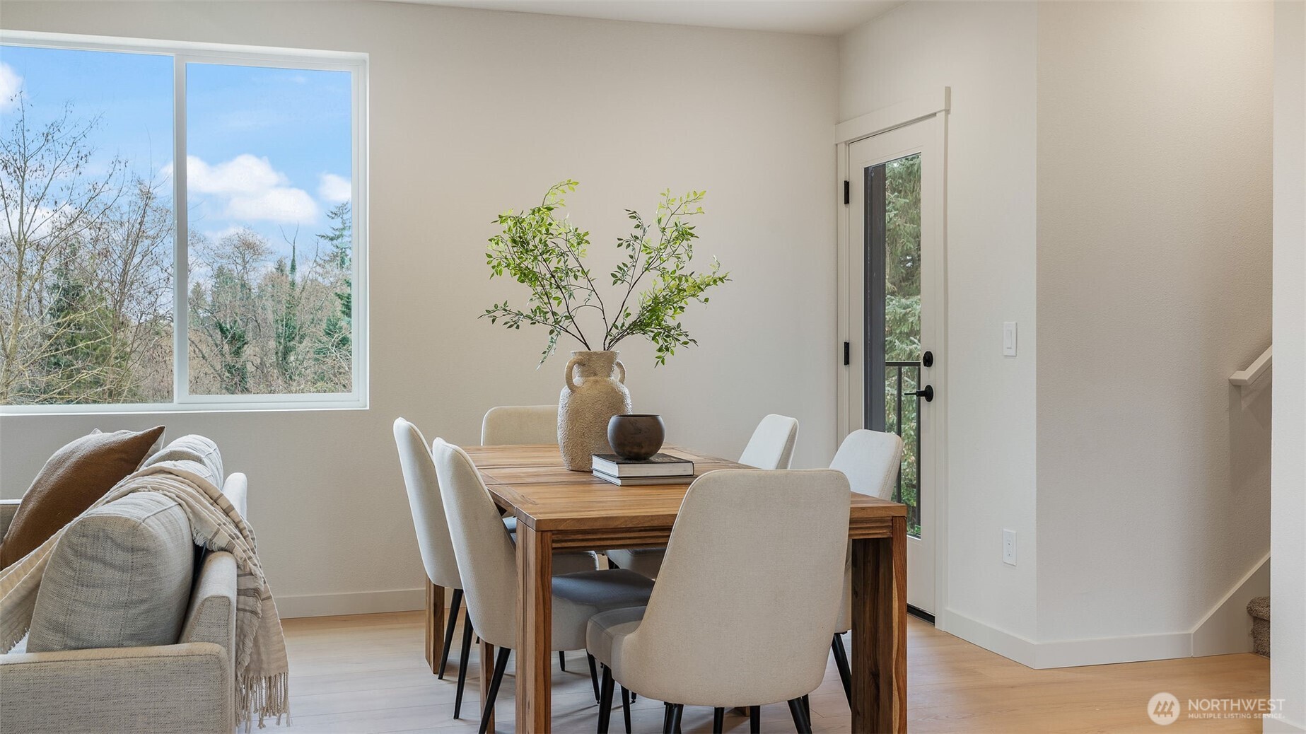 225 106th Street Southwest, Unit A2 Everett, WA 98204 - Photo 4 of 26 a dining room with furniture and wooden floor