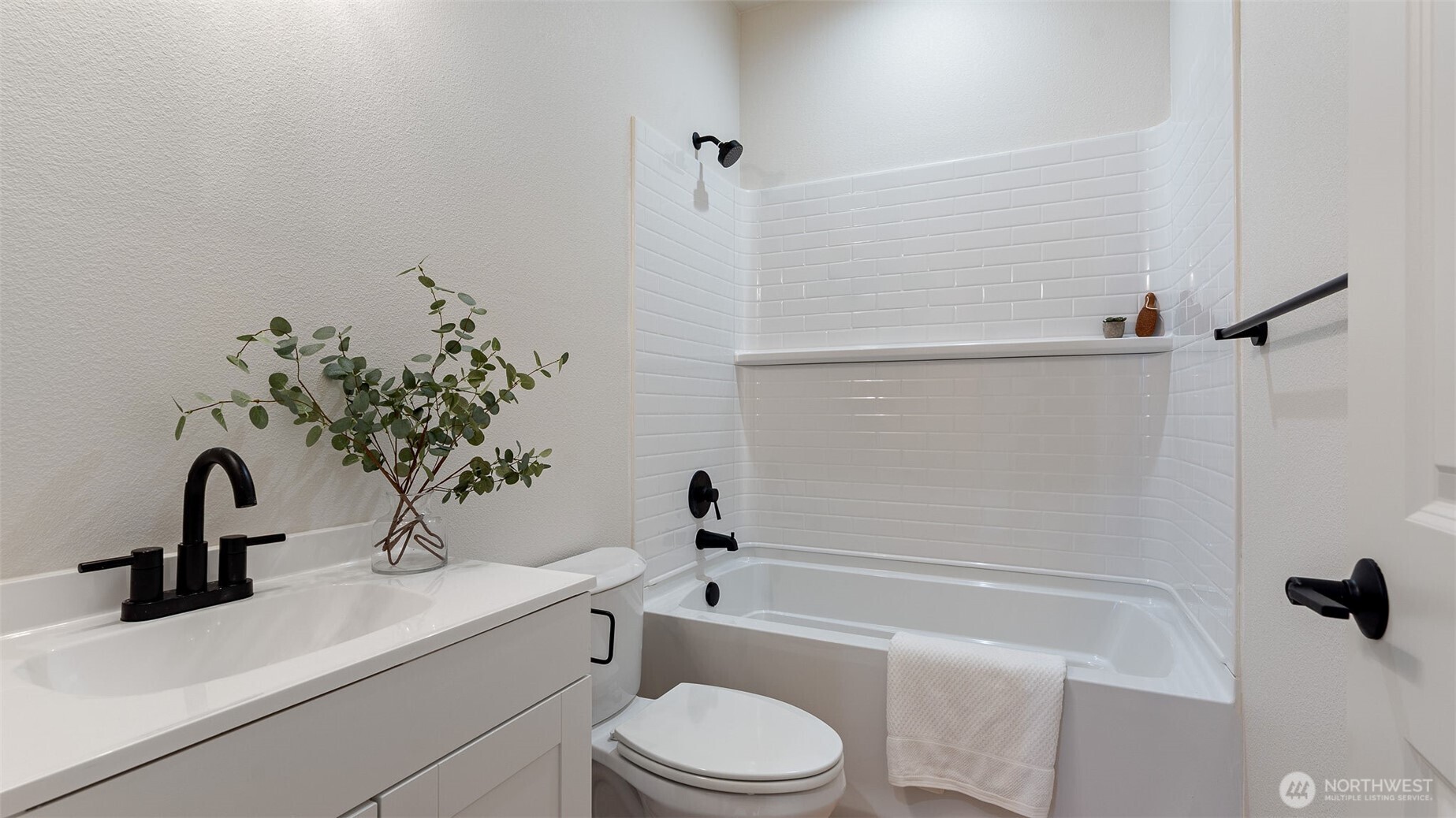225 106th Street Southwest, Unit A2 Everett, WA 98204 - Photo 9 of 26 a bathroom with a sink a toilet and shower