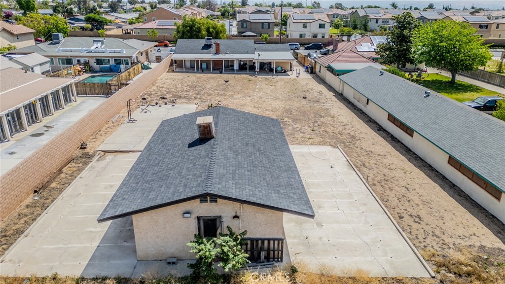 732 South Acacia Avenue Rialto, CA 92376 - Photo 21 of 30 an aerial view of a house with a yard