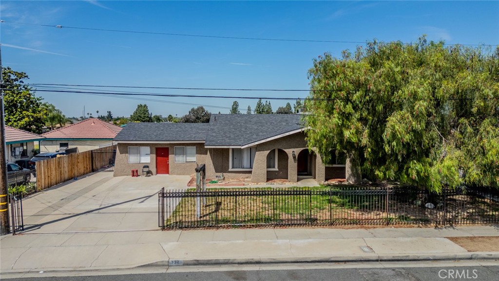 732 South Acacia Avenue Rialto, CA 92376 - Photo 23 of 30 front view of a house with a porch